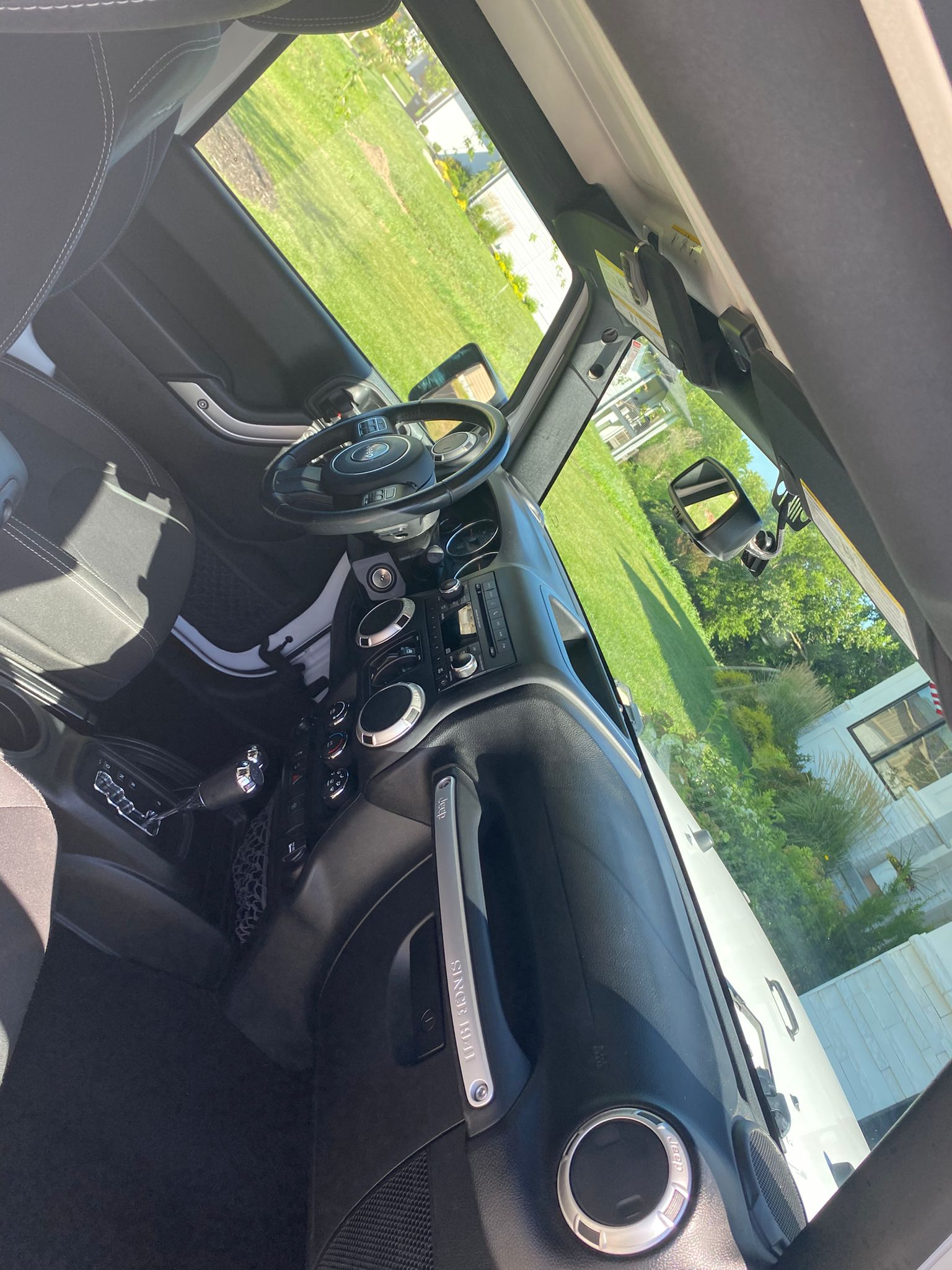 Driver dashboard with clean leather seats and steering wheel